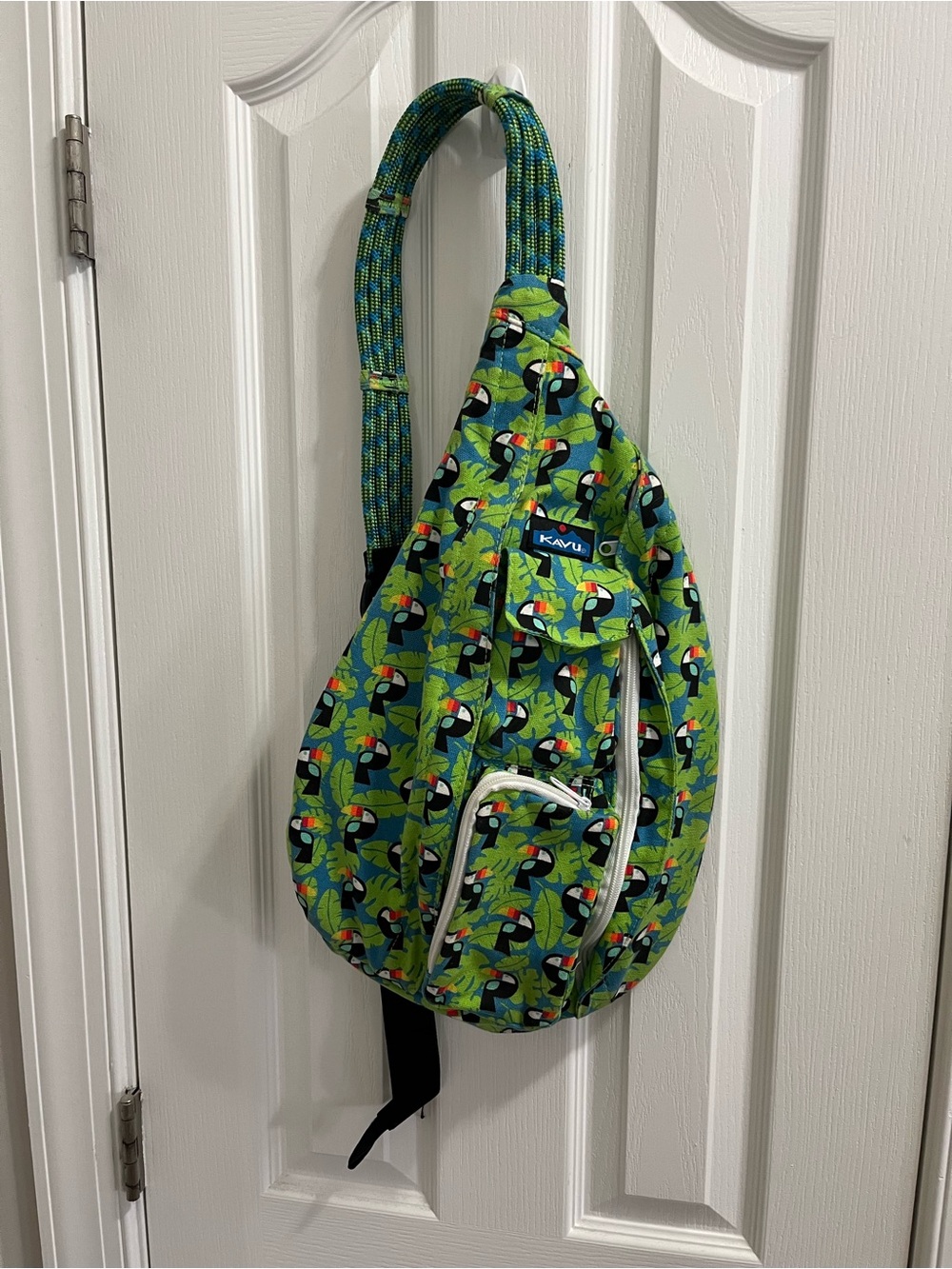 Kavu Green Toucan Rope Sling Backpack with Multicolor Accents